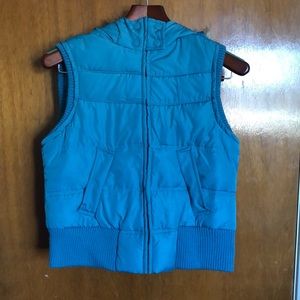 Blue puffer vest with detachable fur hood